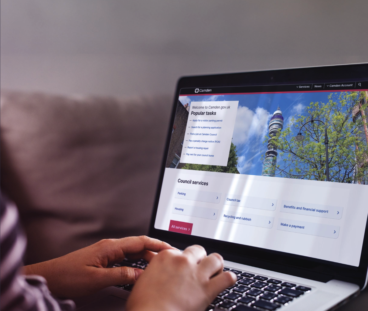 Camden Council homepage on a laptop